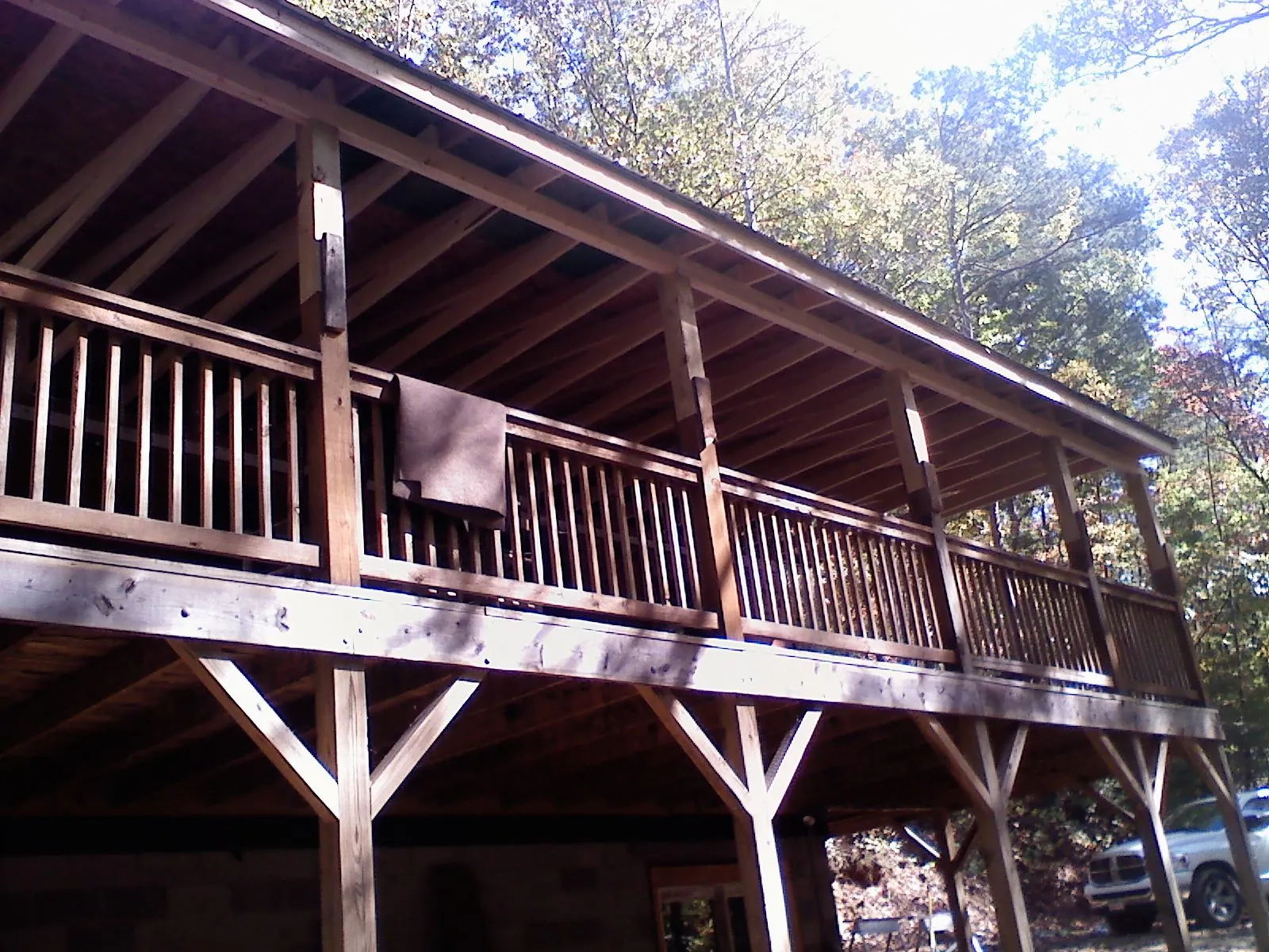 Timber framing under a new elevated porch and deck — Roof Leak Repair in West Blocton by Roofing Brothers